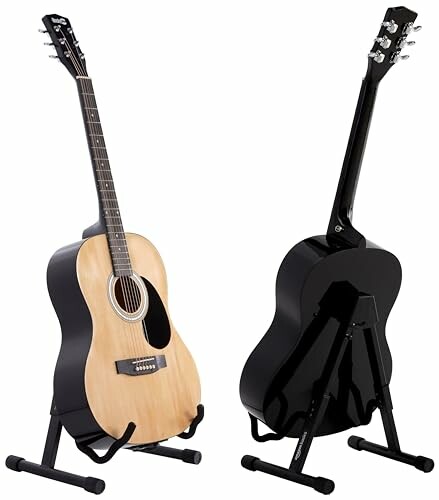 Two acoustic guitars on stands, one natural and one black.