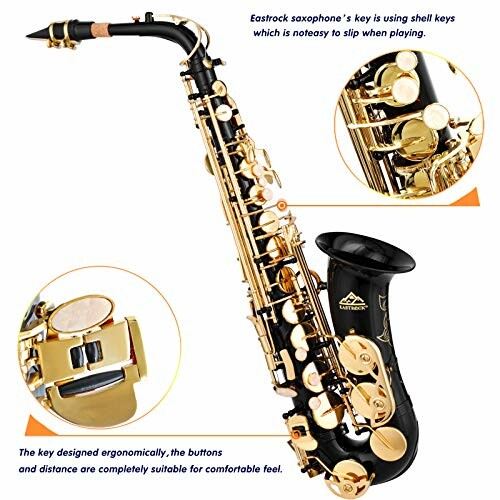 Black and gold saxophone with detailed key design.