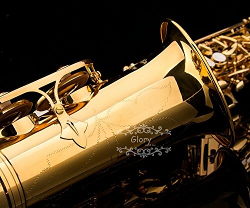 Close-up of a golden saxophone on a dark background.