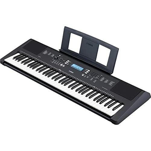 Yamaha electronic keyboard with sheet music holder